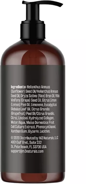 A black  bottle with a sticker showing the Ingredients of M3 Naturals Anti Cellulite Massage Oil 